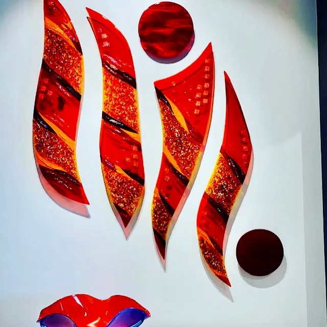 Kiln-fired glass sculpture with rich transparency