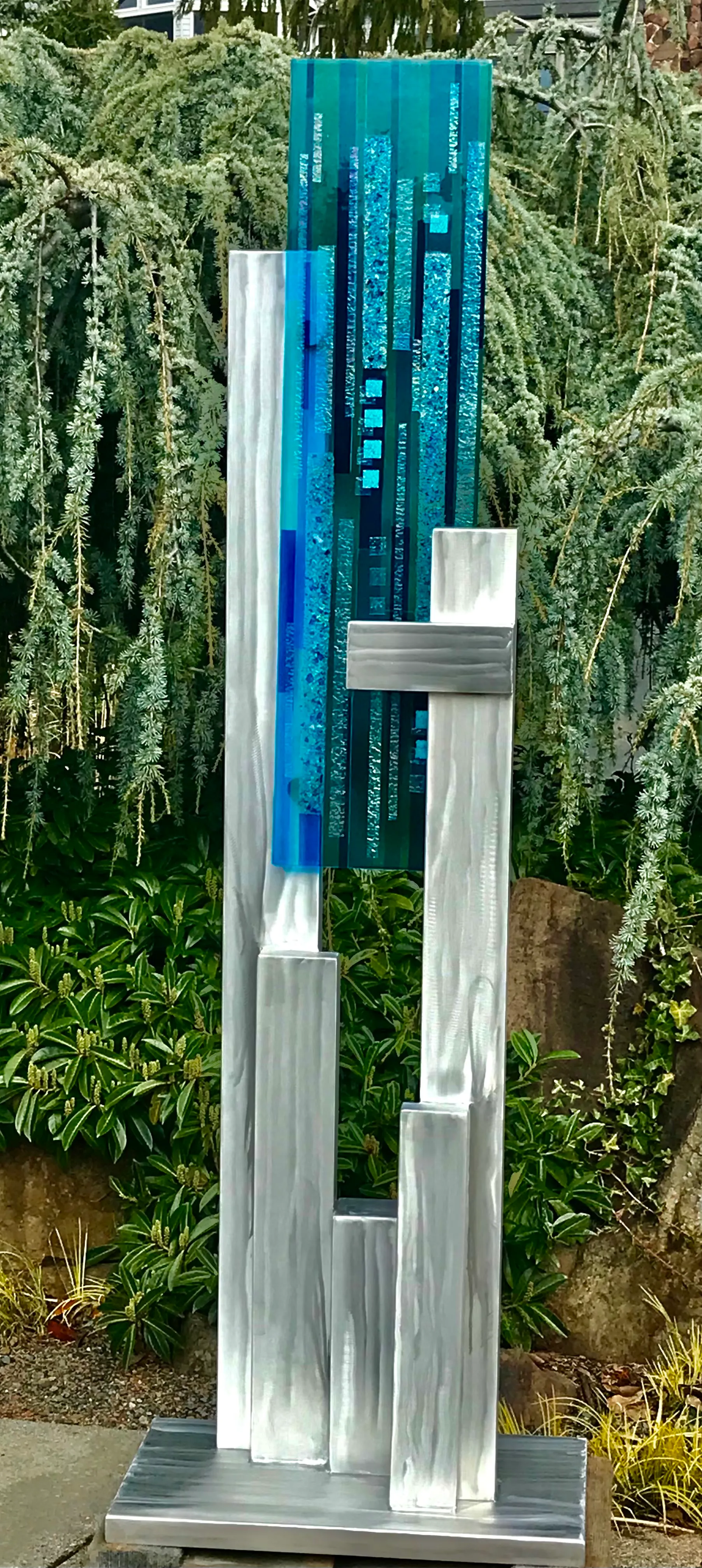 Metal and glass collaborative art piece by the Larsons