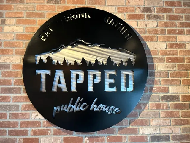 Custom metal sign with cut lettering