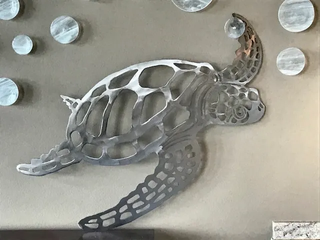 Steel sculpture with bold geometric form