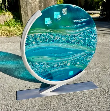 Metal and glass collaborative sculpture by Robin and Chris Larson