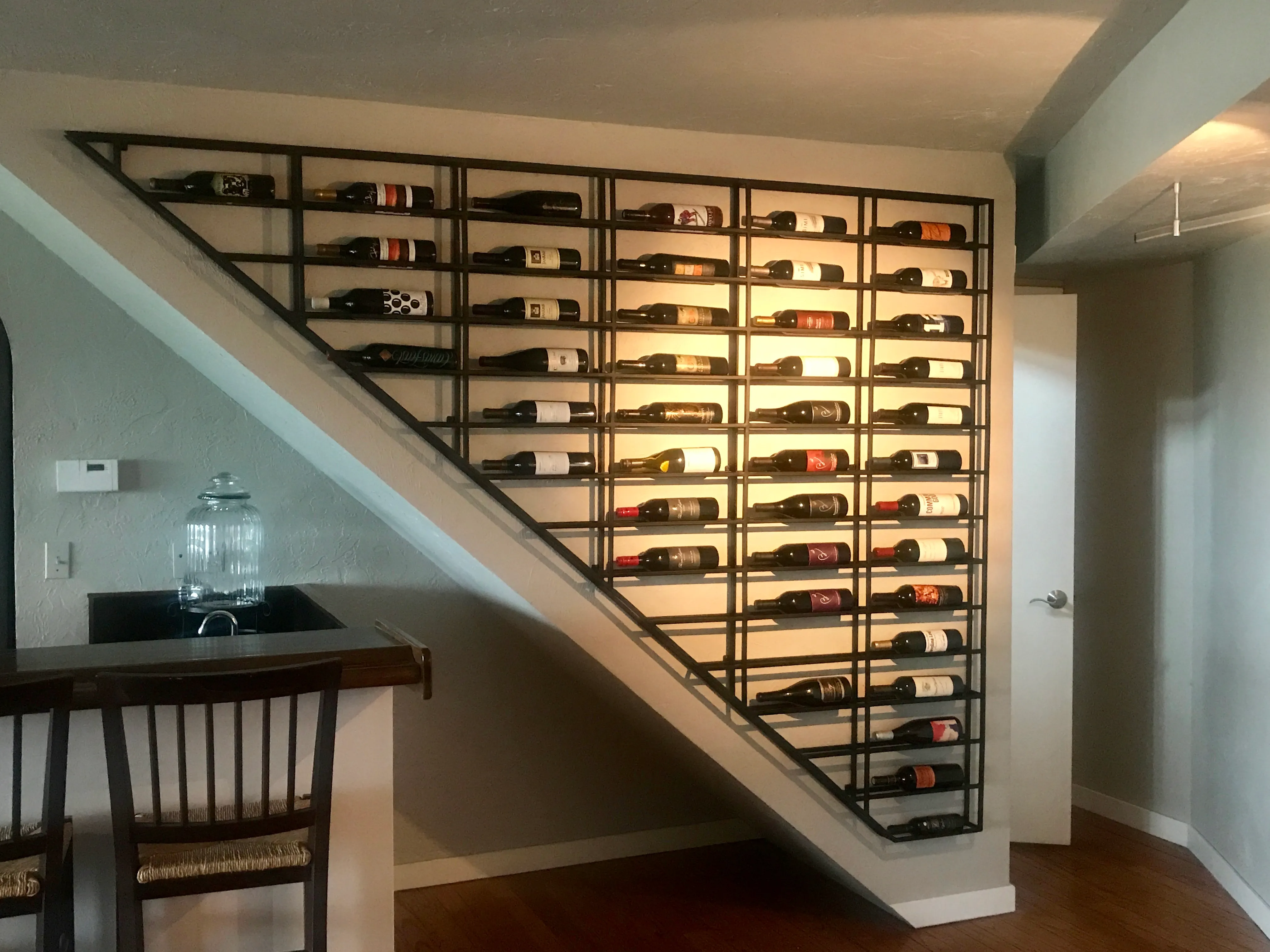 Custom wine rack with welded metal frame