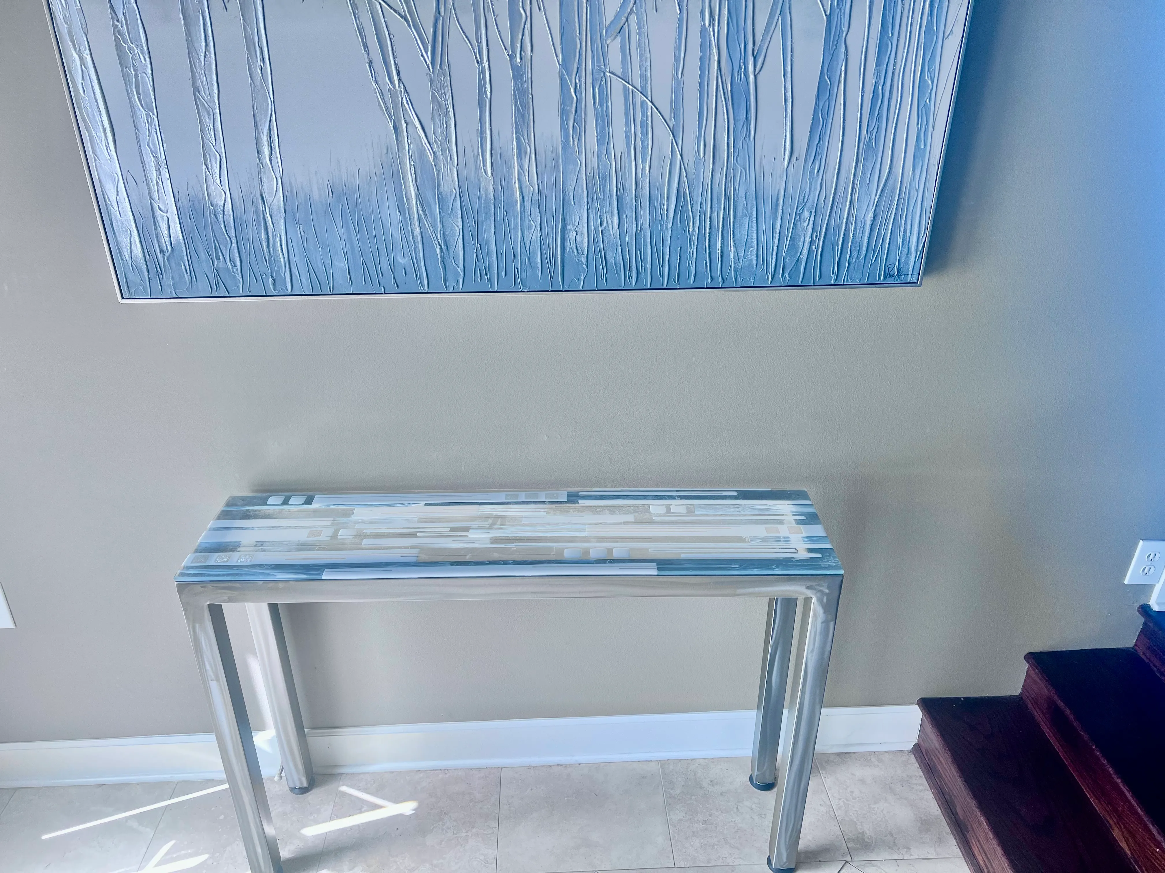 Glass tabletop with vibrant abstract pattern