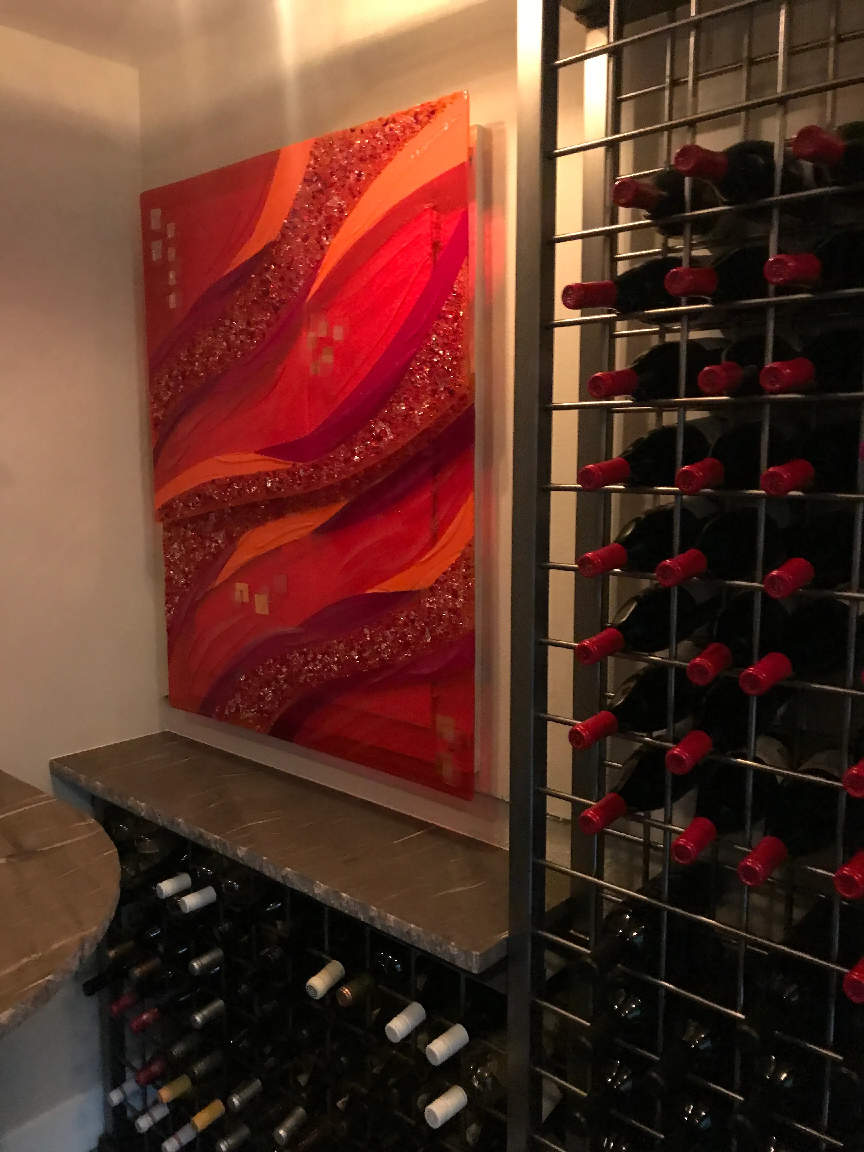 Glass sculpture with sweeping motion and rich tones