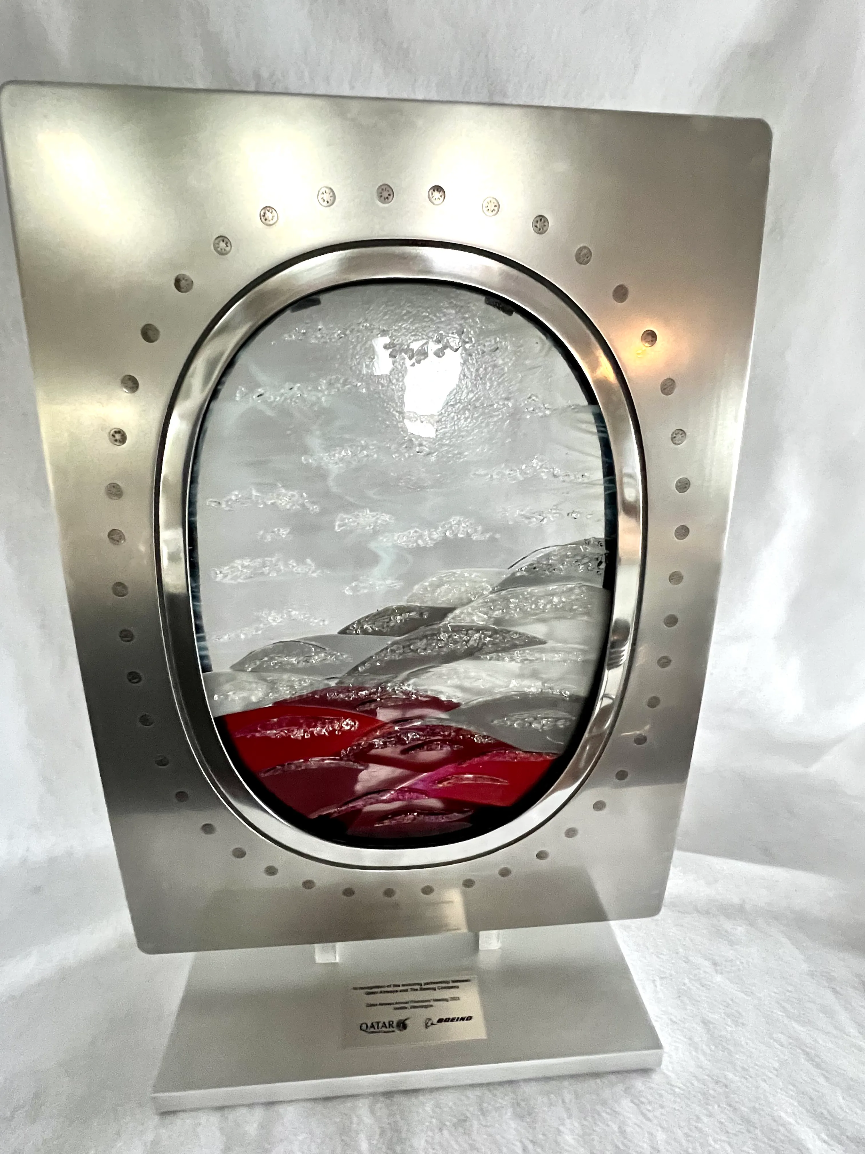 Glass award with sculpted detail