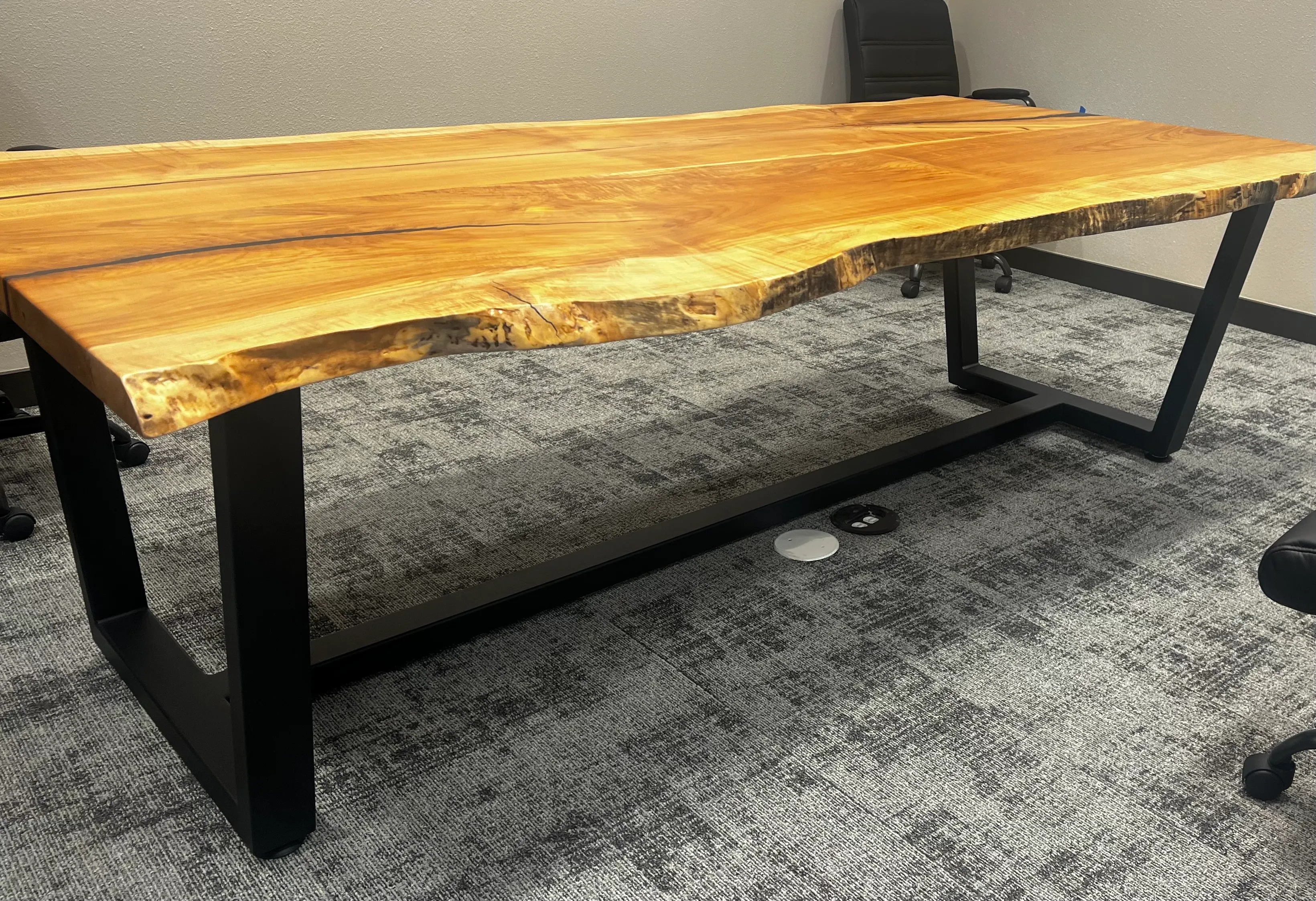 Metal furniture with sculptural base design