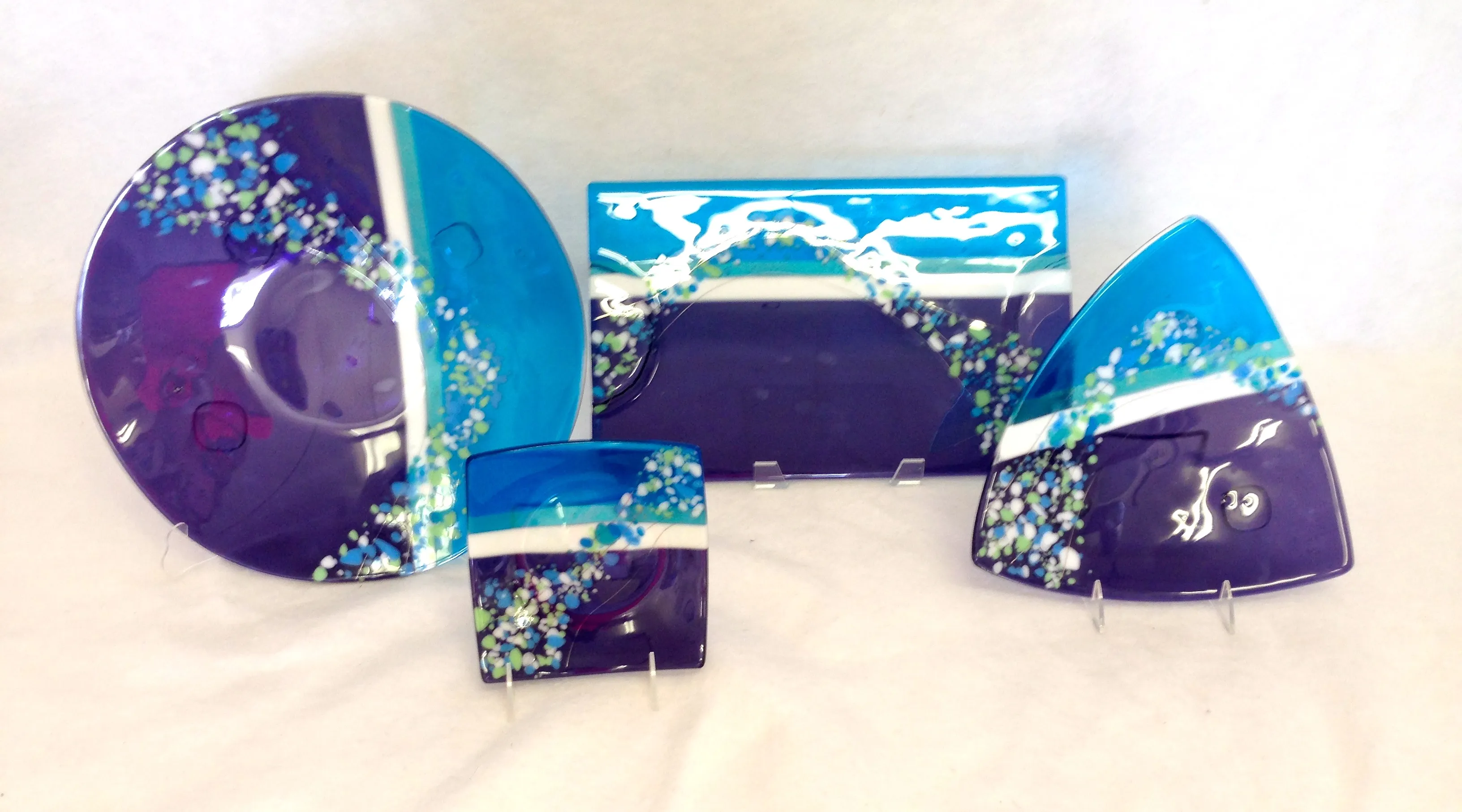 Fused glass platter with bold color accents