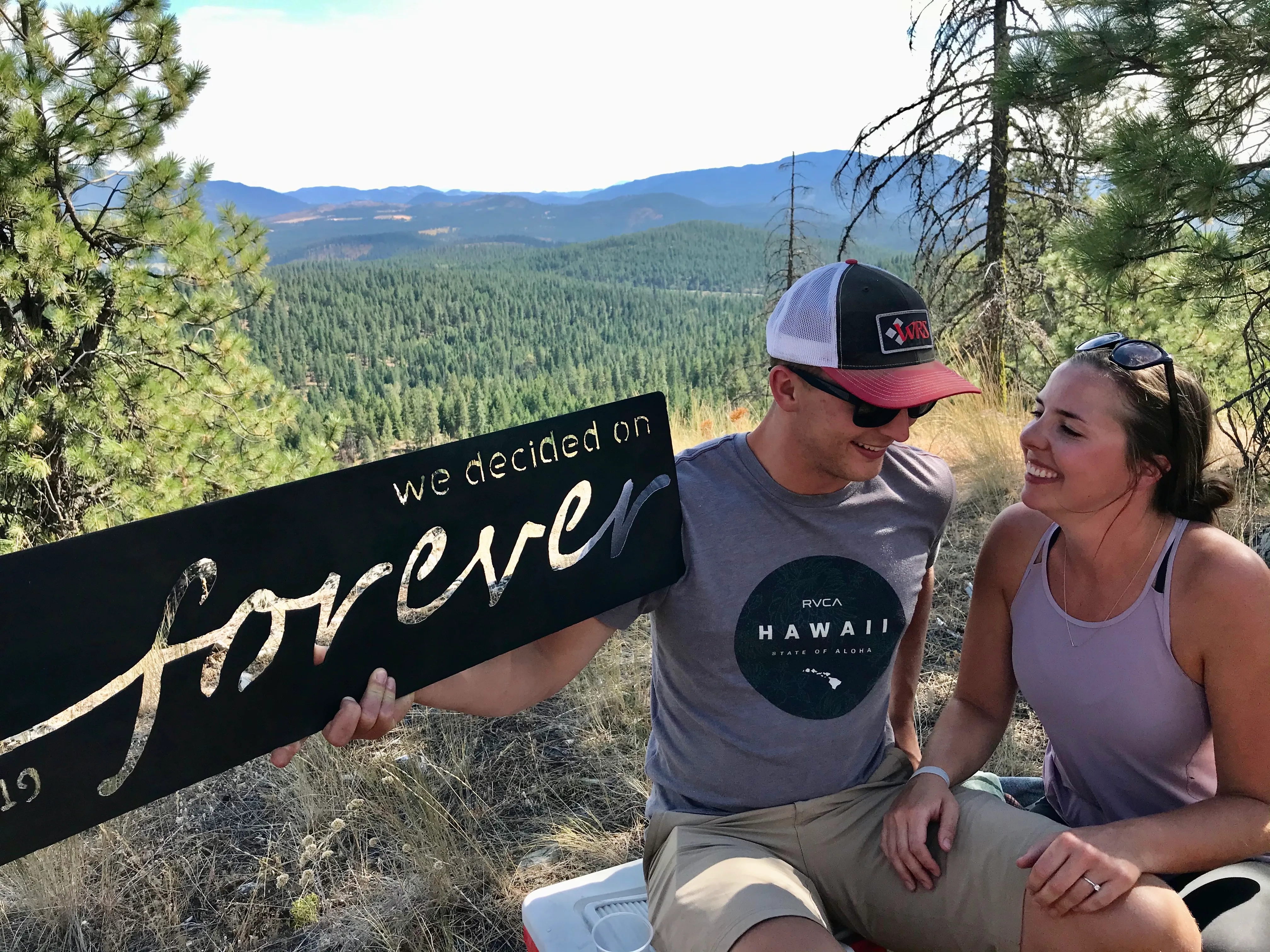 Hand-fabricated metal sign by Chris Larson