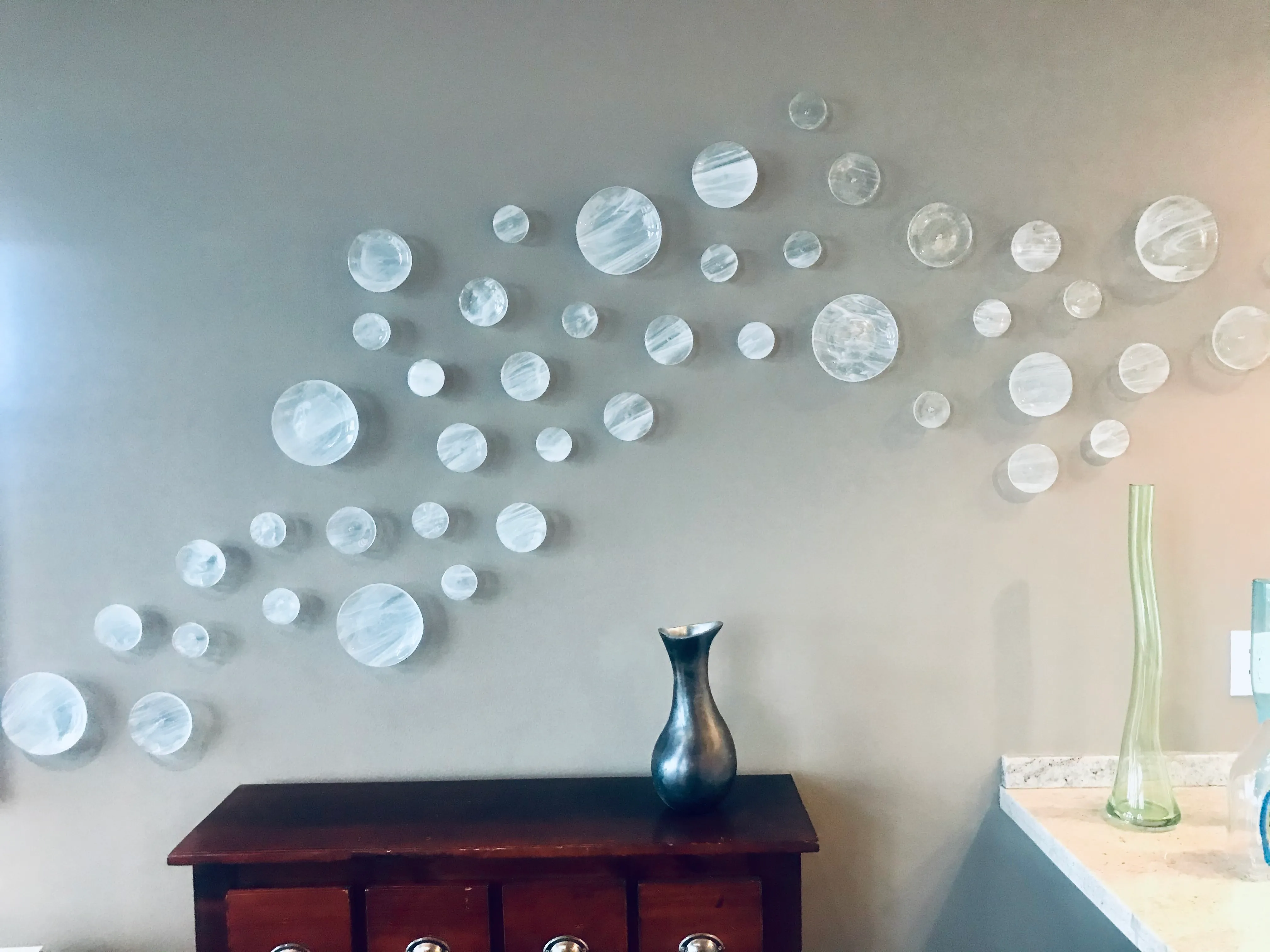 Fused glass sculpture with bold color palette