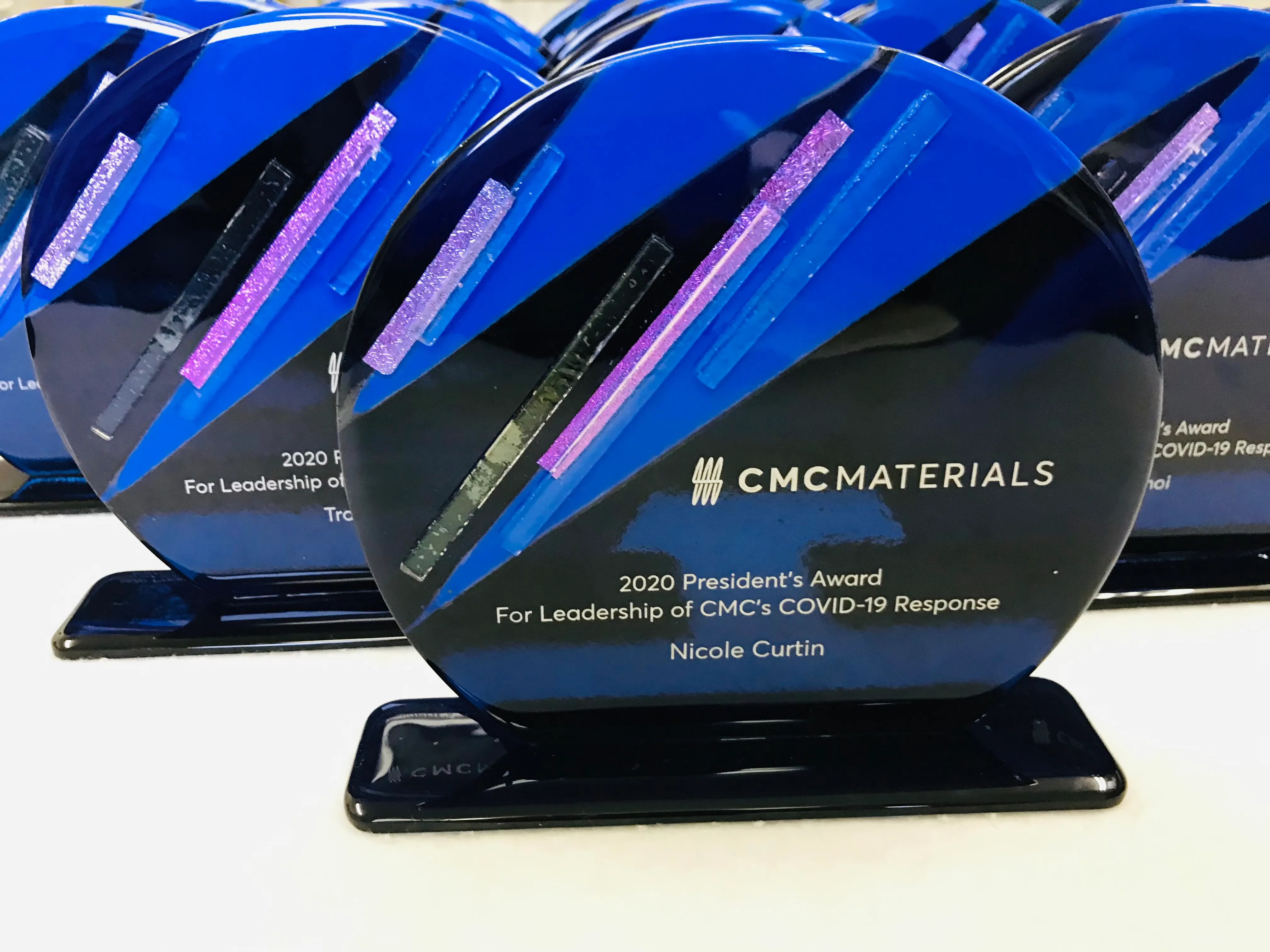 Kiln-fired glass award with rich color palette