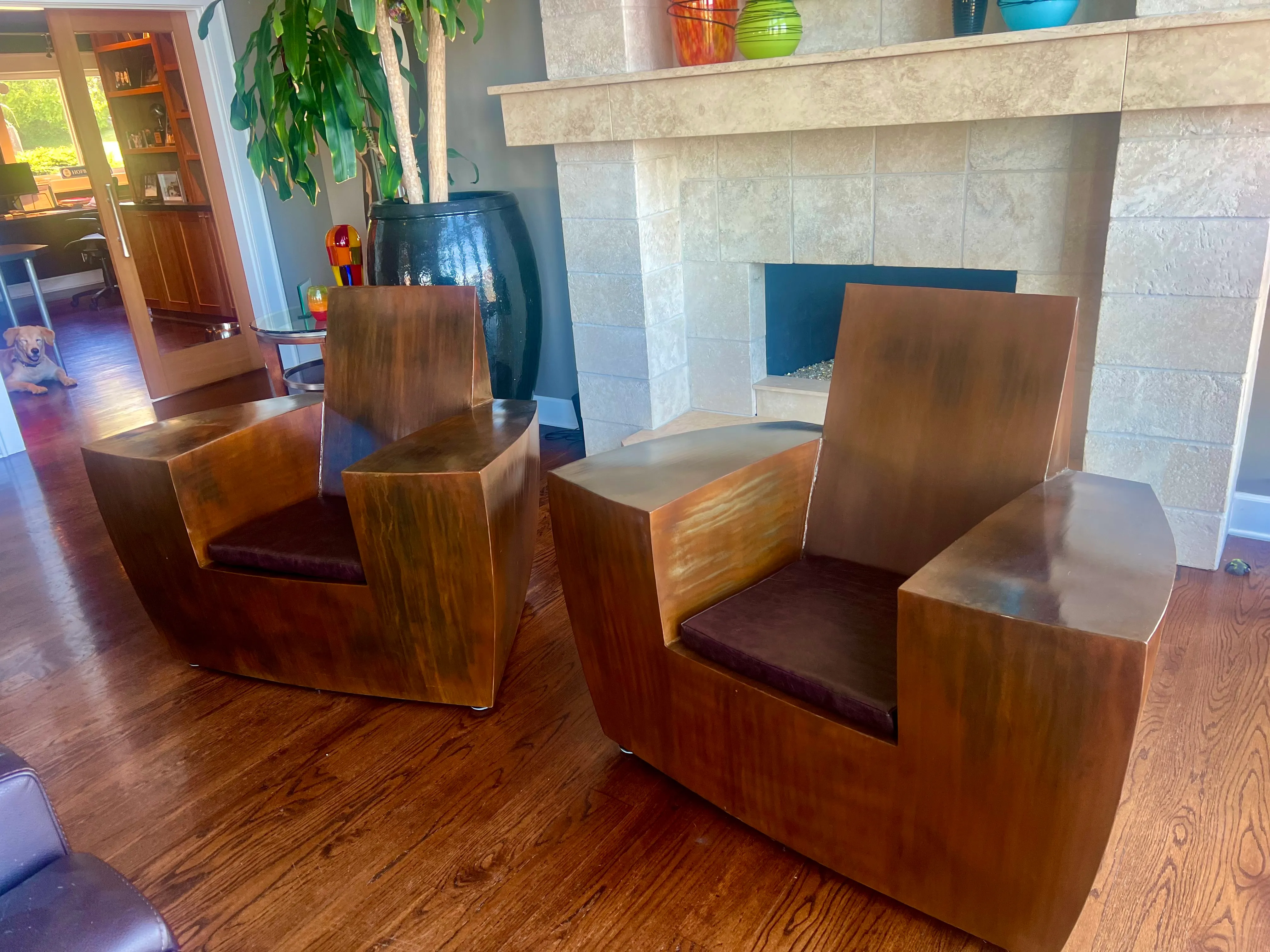 Steel furniture piece with polished finish