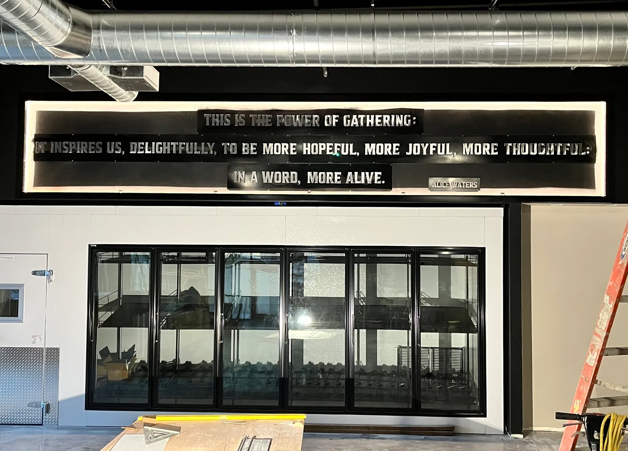 Sign installed at Tapped